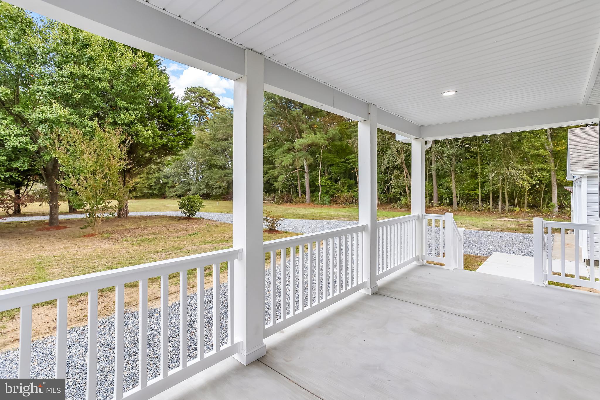 26519 Siloam Road Salisbury, MD 21801 - Photo 8 of 69 a view of a patio with a large window