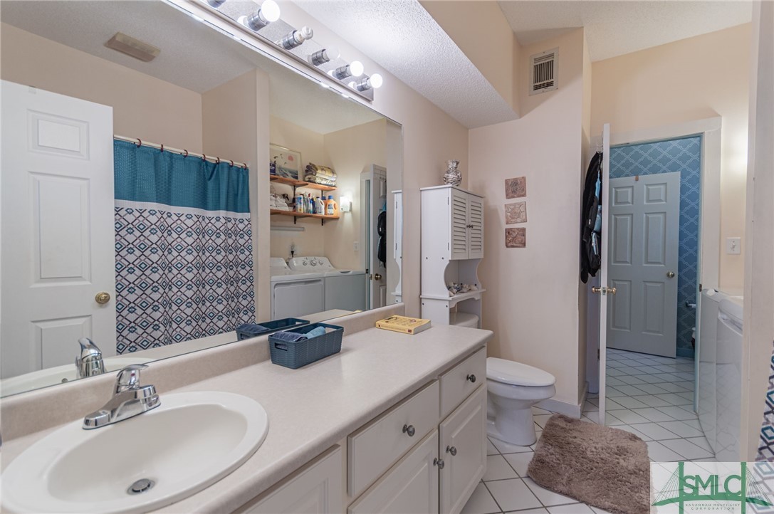 5 Pine Street Tybee Island, GA 31328 - Photo 18 of 35 Full bath with tub/shower off downstairs bedroom.