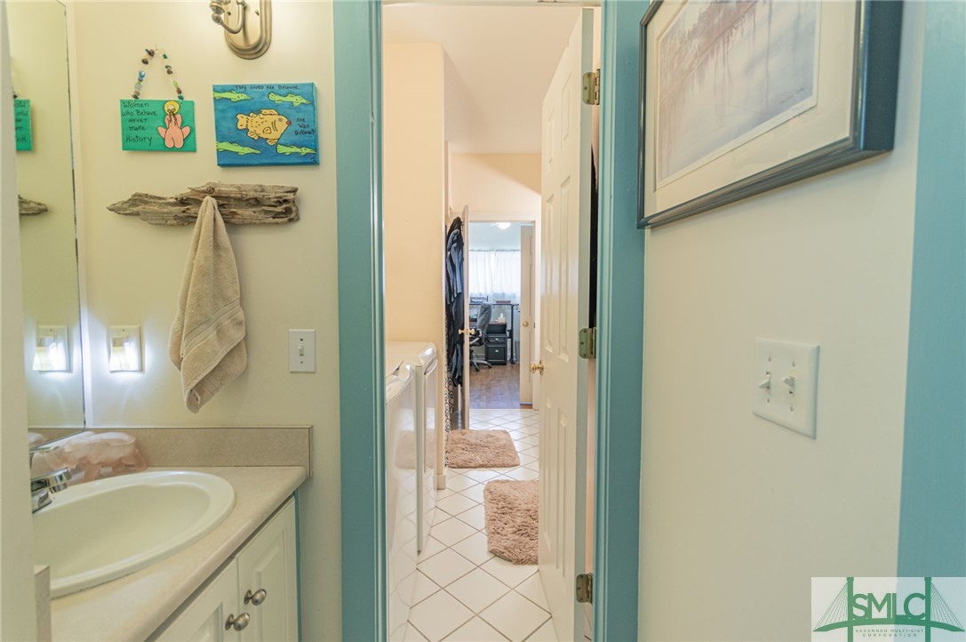 5 Pine Street Tybee Island, GA 31328 - Photo 21 of 35 Hallway half bath.