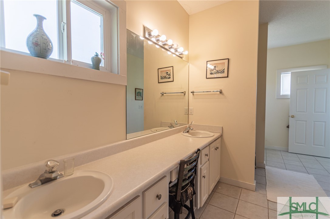 5 Pine Street Tybee Island, GA 31328 - Photo 27 of 35 Primary en-suite bath upstairs