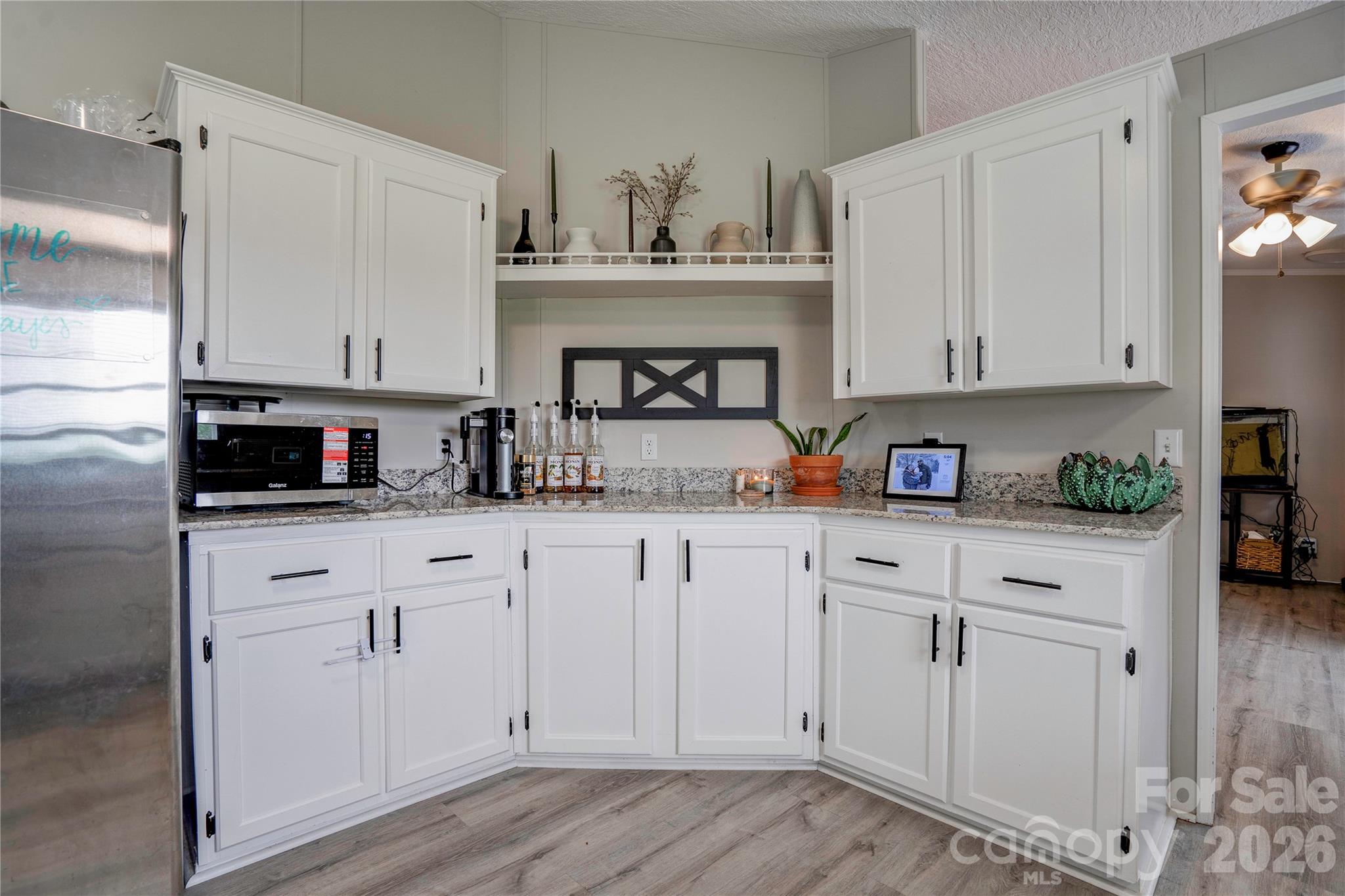 251 Indian Trail Rutherfordton, NC 28139 - Photo 14 of 37 a kitchen with white cabinets and sink