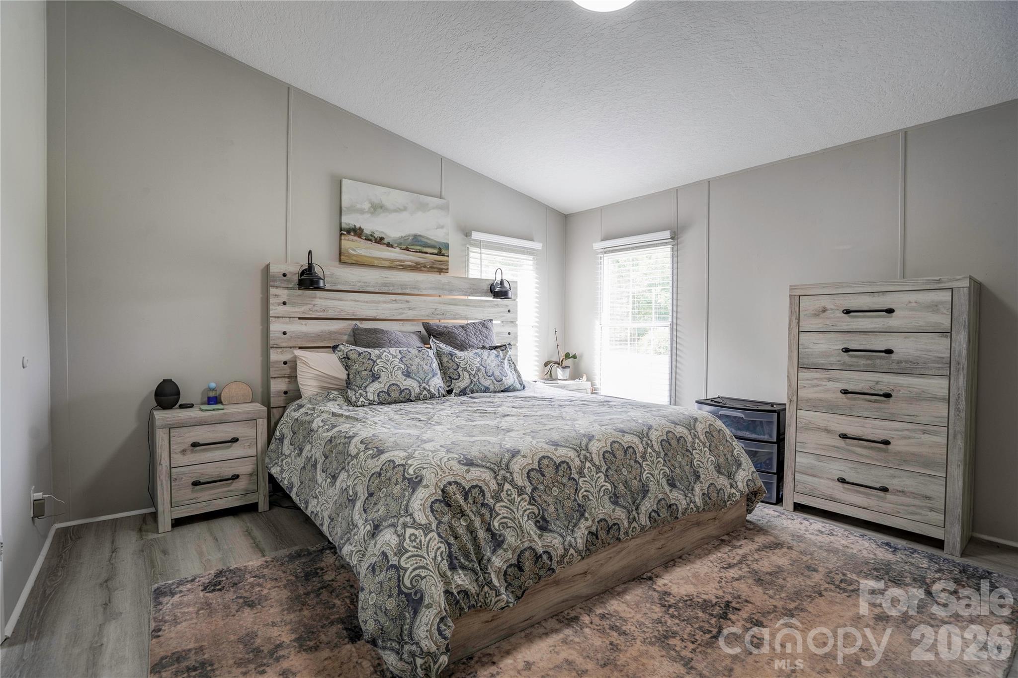 251 Indian Trail Rutherfordton, NC 28139 - Photo 18 of 37 a bedroom with a bed and a window