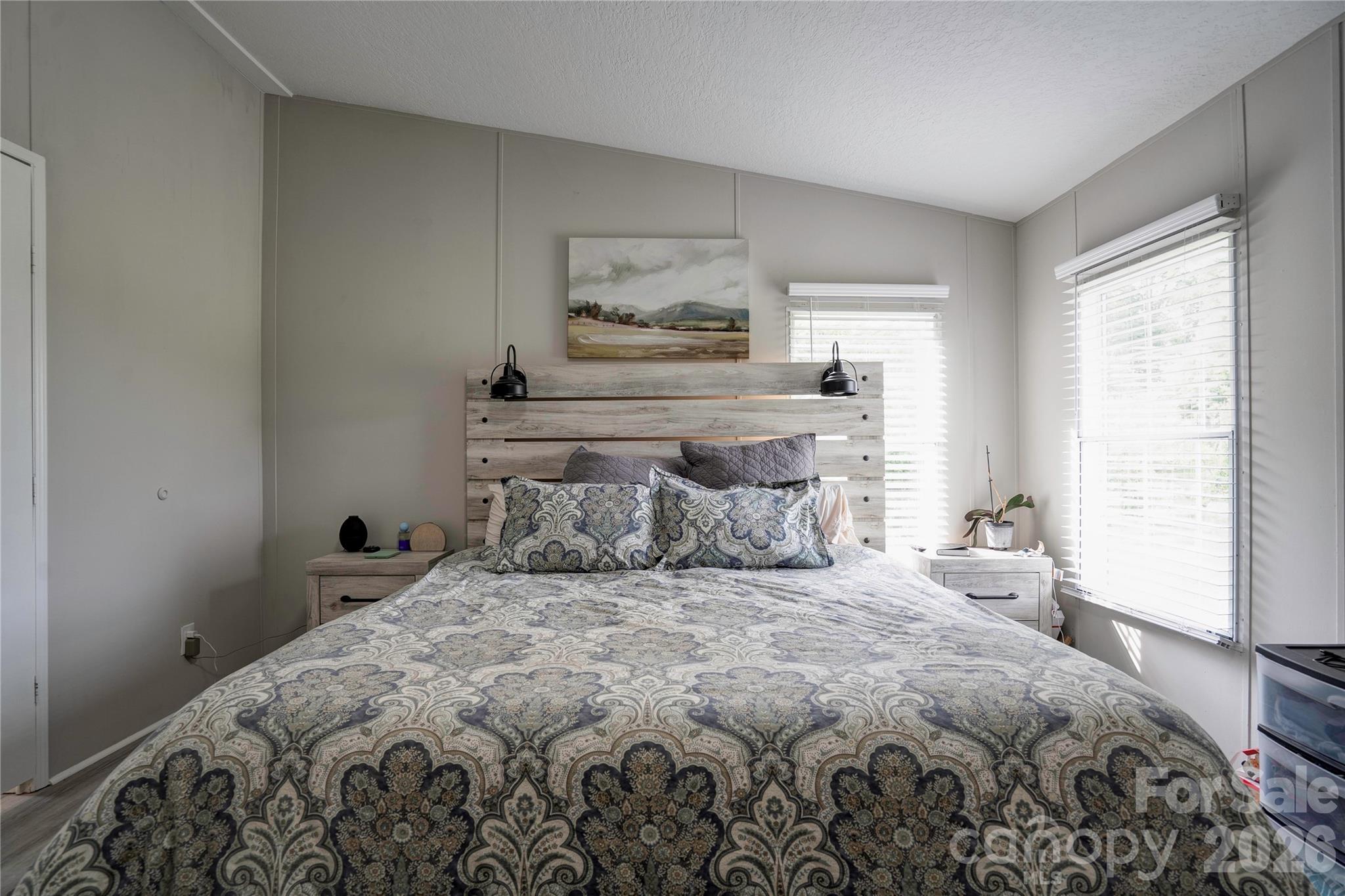 251 Indian Trail Rutherfordton, NC 28139 - Photo 19 of 37 a bedroom with a large bed and a window