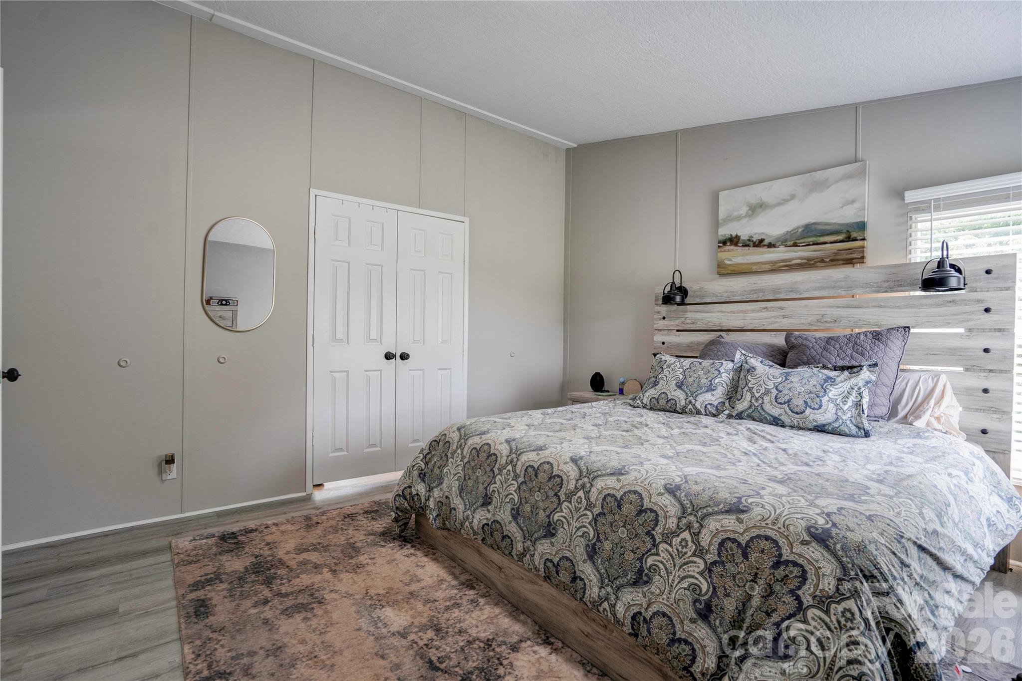 251 Indian Trail Rutherfordton, NC 28139 - Photo 20 of 37 a bedroom with a bed and cabinets