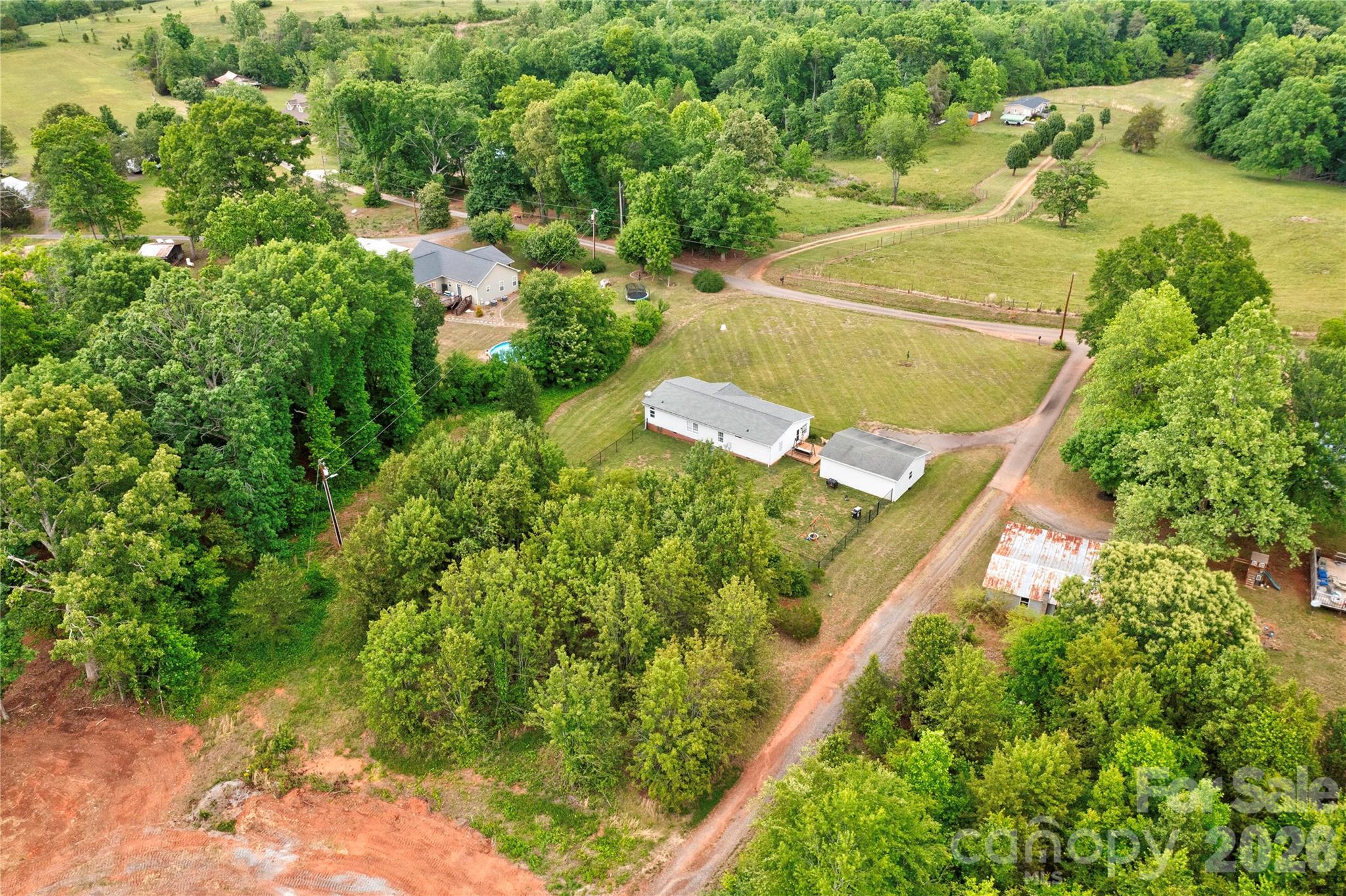 251 Indian Trail Rutherfordton, NC 28139 - Photo 2 of 37 an aerial view of a house with a yard