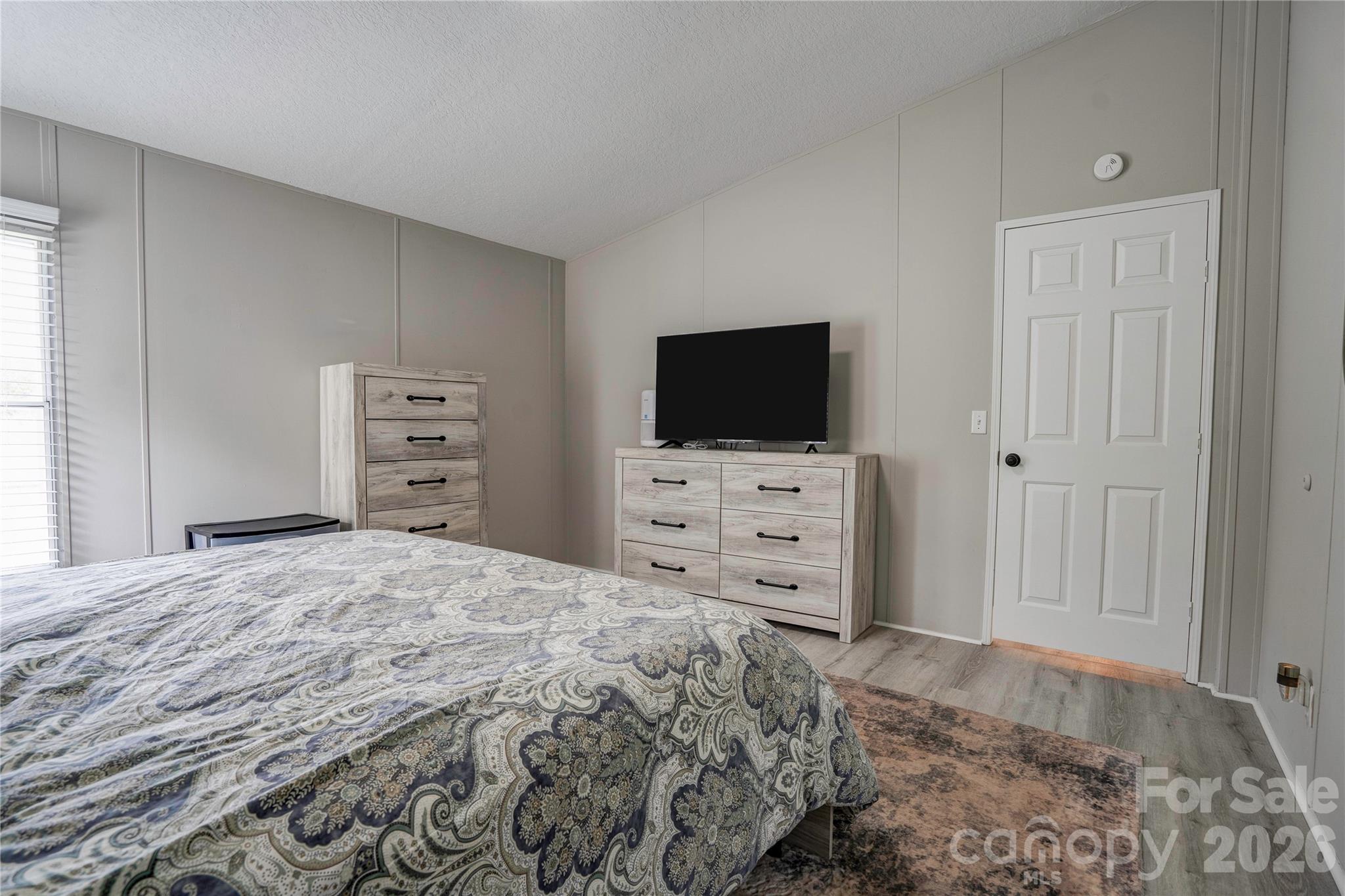 251 Indian Trail Rutherfordton, NC 28139 - Photo 21 of 37 a bedroom with a bed and a television
