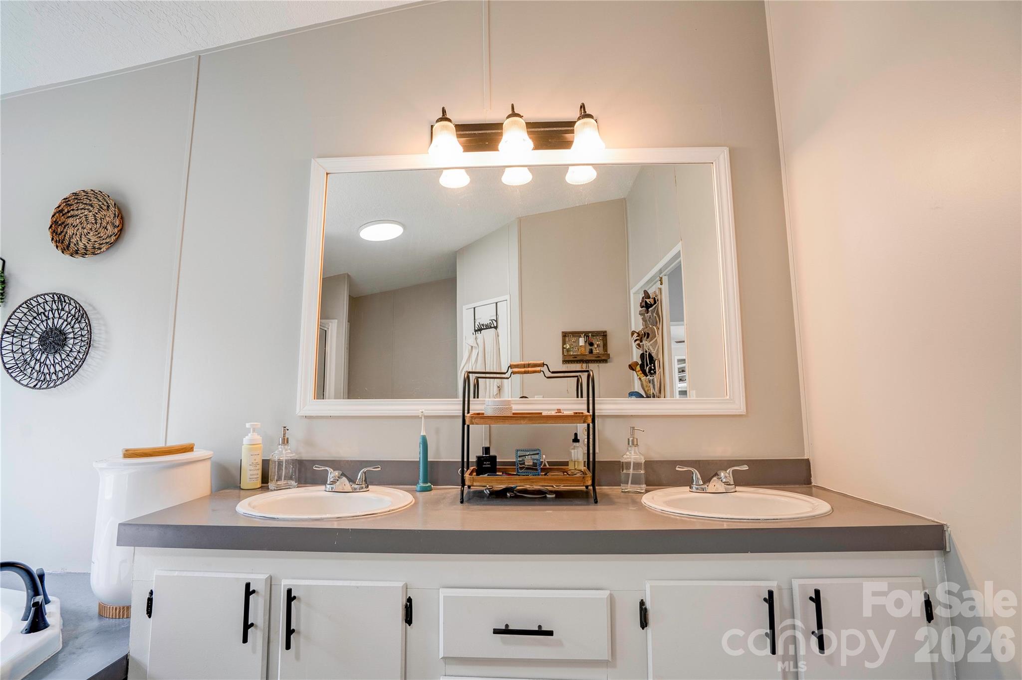 251 Indian Trail Rutherfordton, NC 28139 - Photo 22 of 37 a bathroom with a sink and a mirror