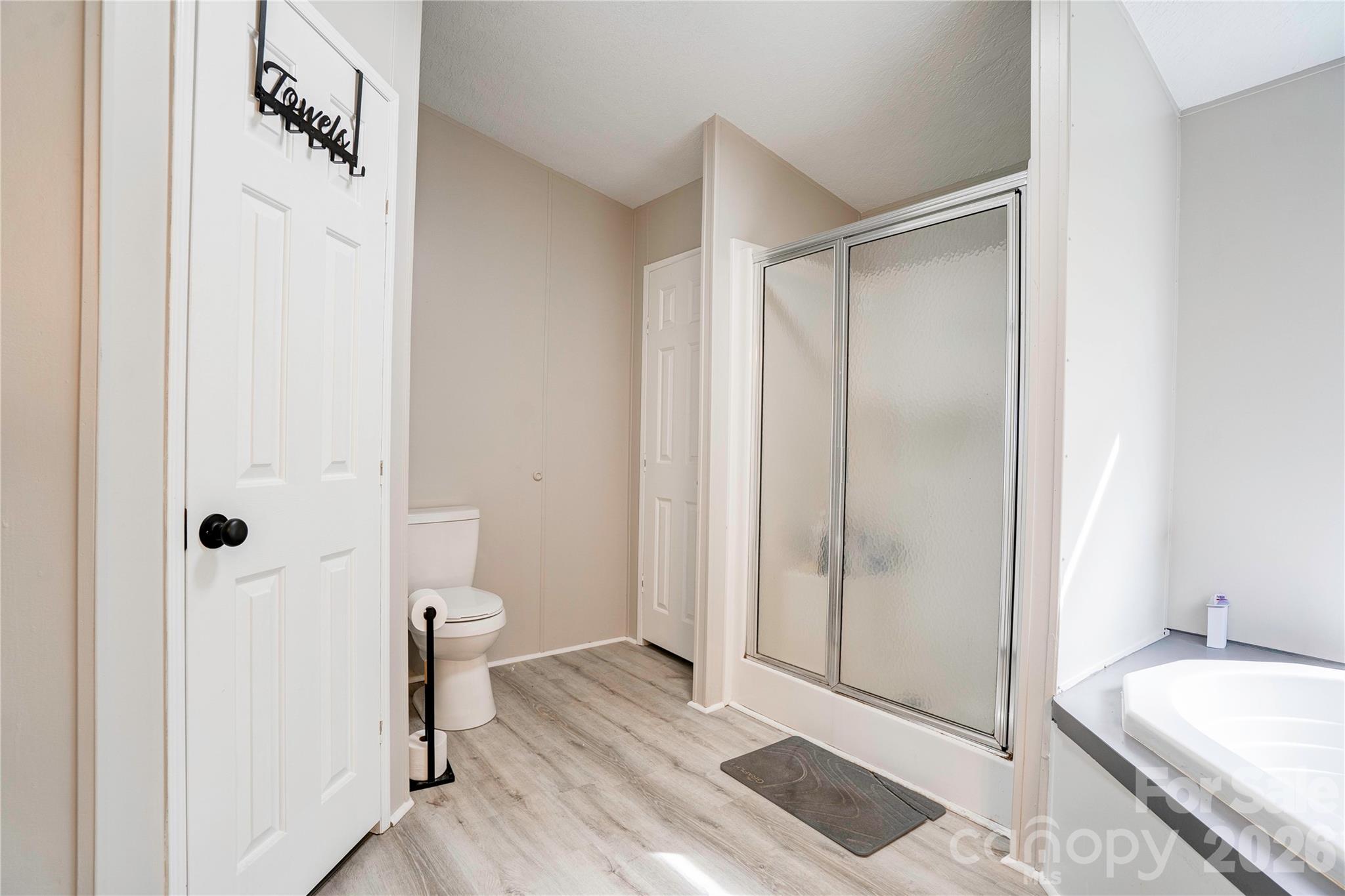 251 Indian Trail Rutherfordton, NC 28139 - Photo 24 of 37 a bathroom with a granite countertop sink and a mirror