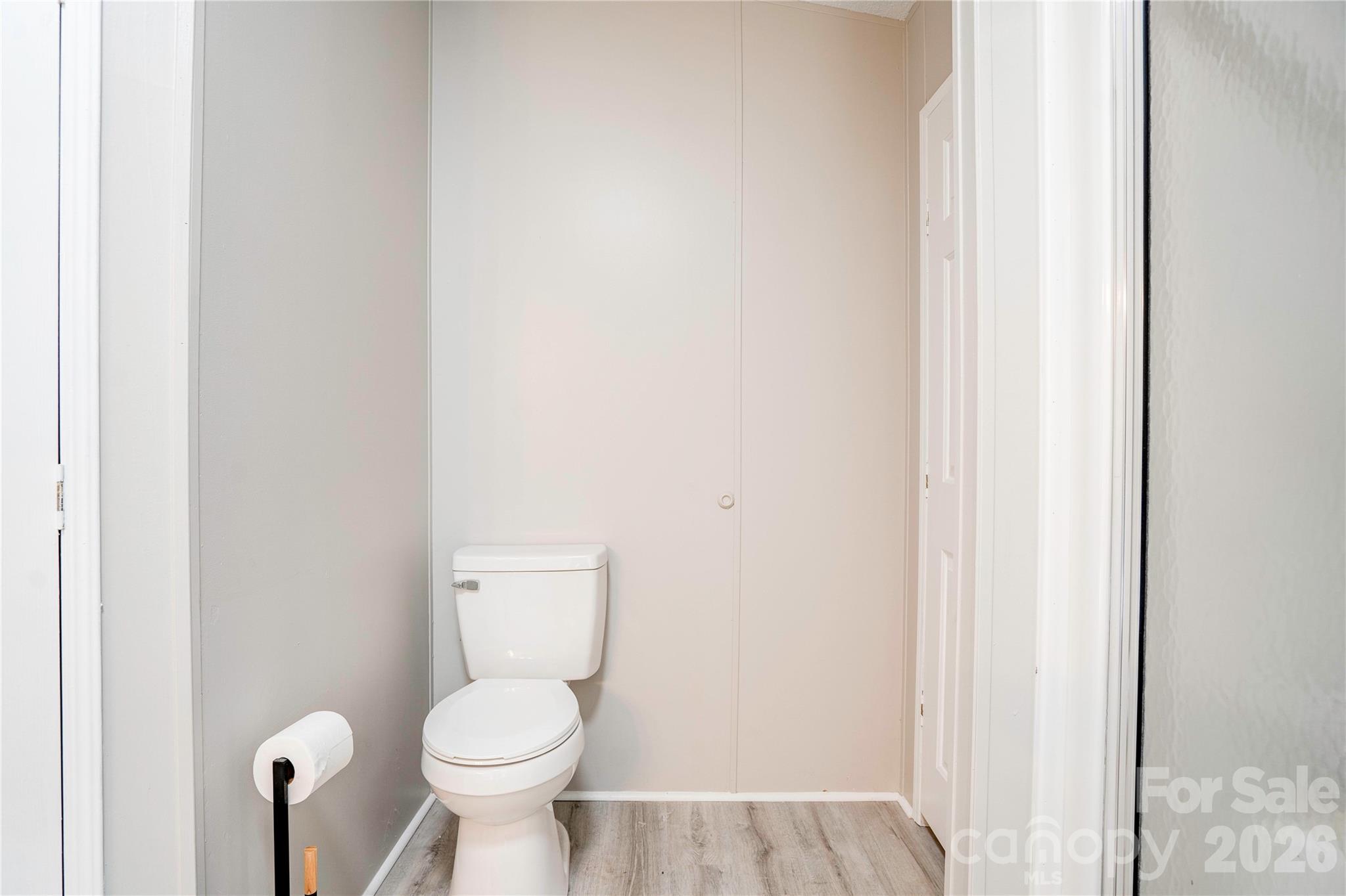 251 Indian Trail Rutherfordton, NC 28139 - Photo 25 of 37 a white toilet sitting next to a white wall