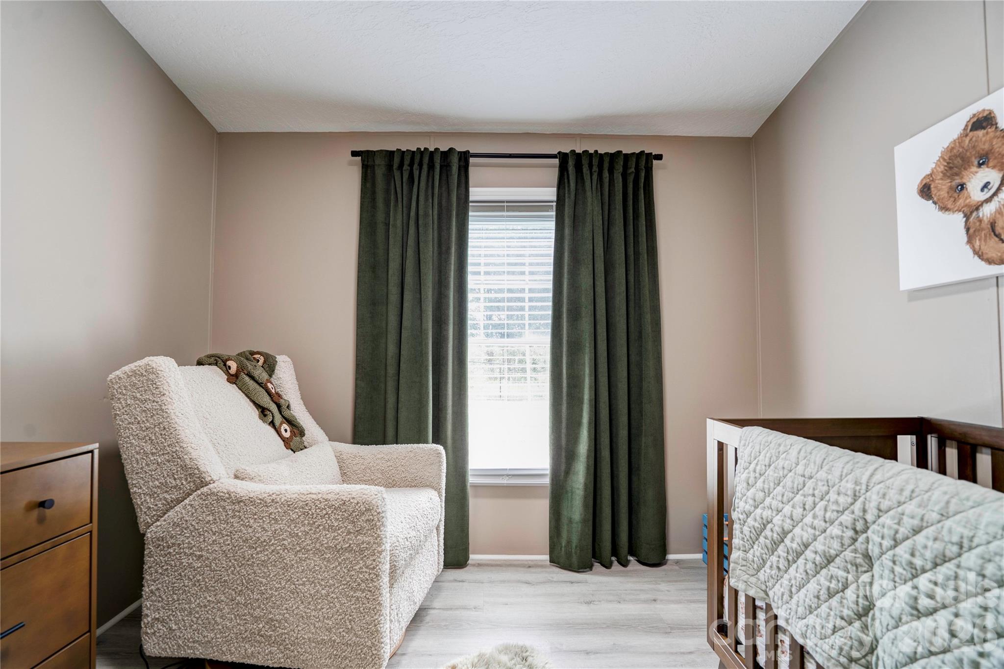 251 Indian Trail Rutherfordton, NC 28139 - Photo 27 of 37 a bedroom with a bed and a window