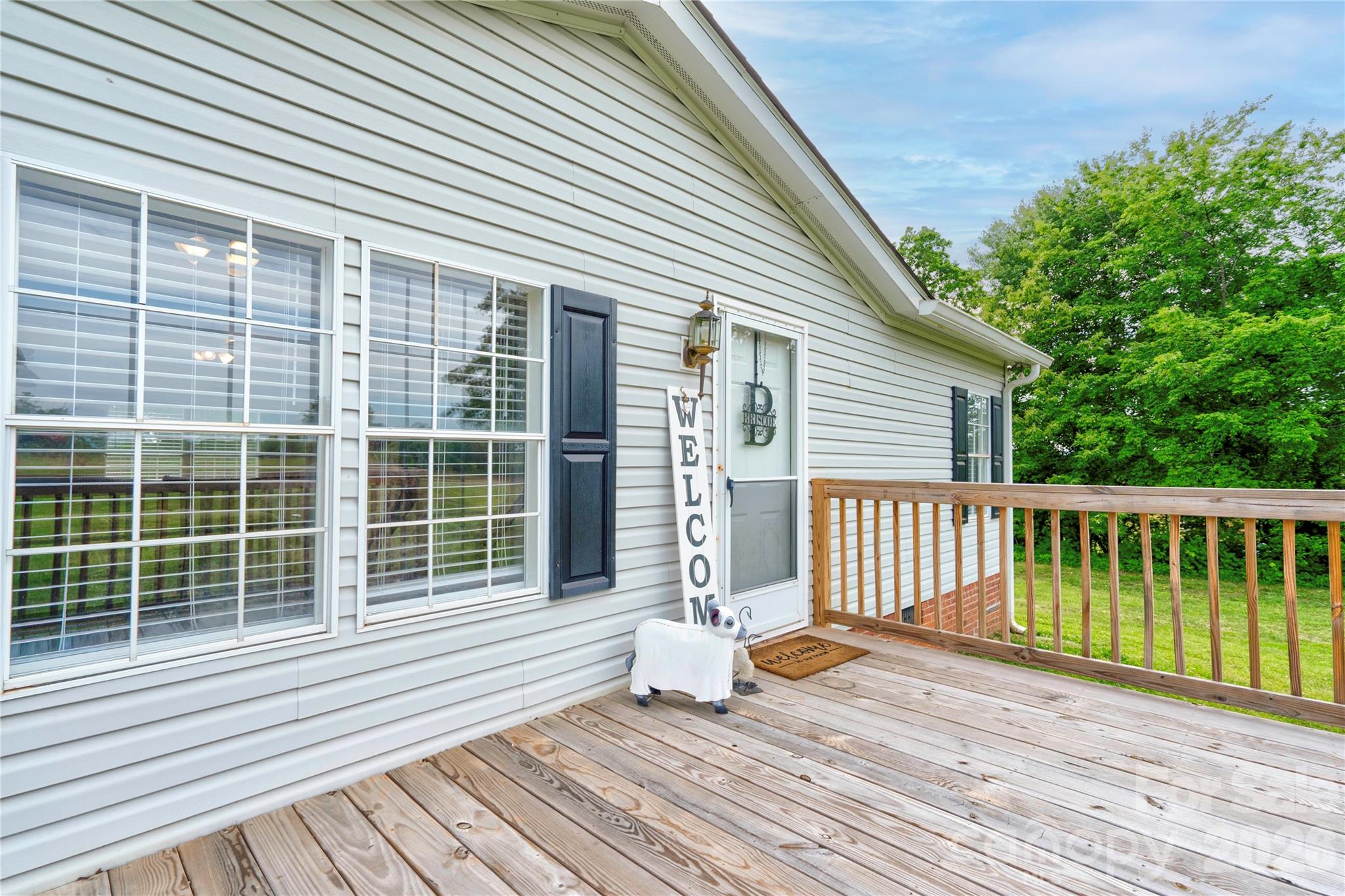 251 Indian Trail Rutherfordton, NC 28139 - Photo 8 of 37 a view of a deck with wooden floor and fence