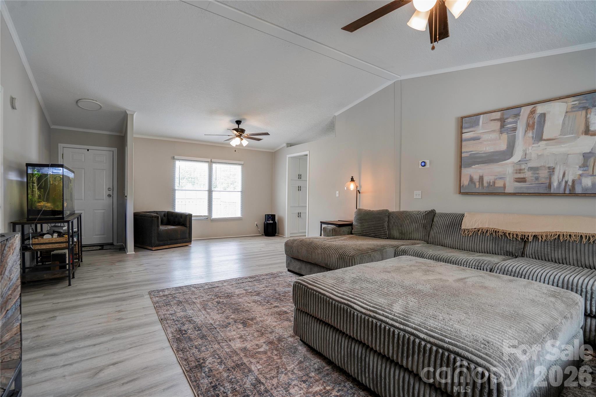 251 Indian Trail Rutherfordton, NC 28139 - Photo 10 of 37 a living room with furniture a couch and a chandelier