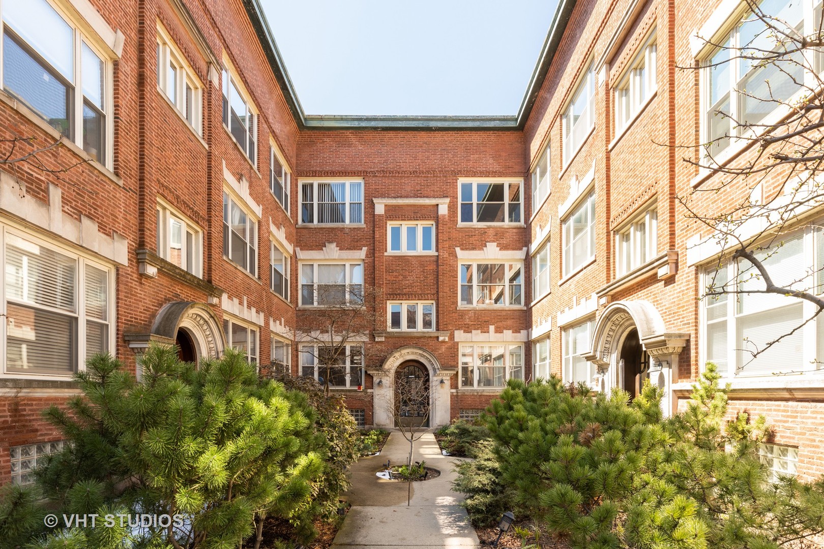 4632 North Racine Avenue, Unit 2 Chicago, IL 60640 - Photo 1 of 12 a front view of a building
