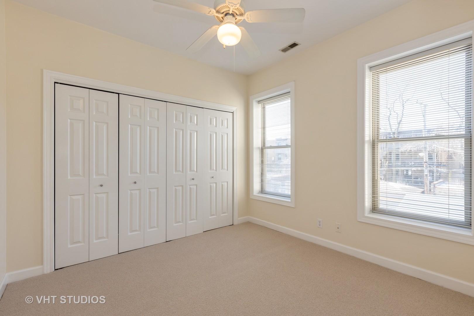 4632 North Racine Avenue, Unit 2 Chicago, IL 60640 - Photo 7 of 12 a view of an empty room with a window