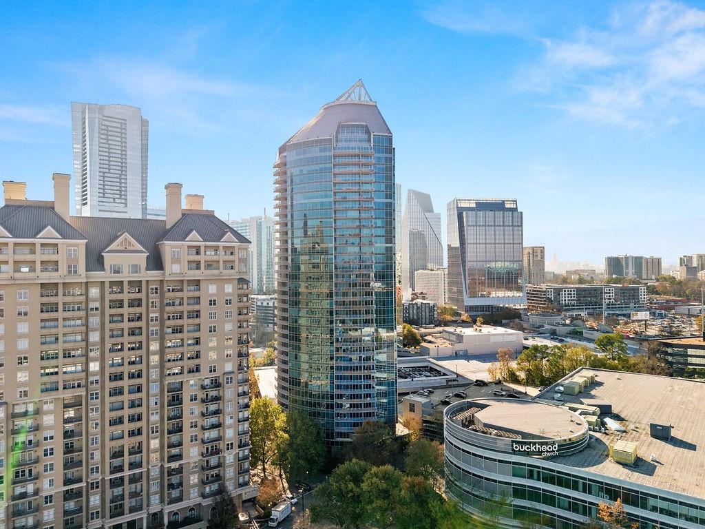 a view of a city with tall buildings