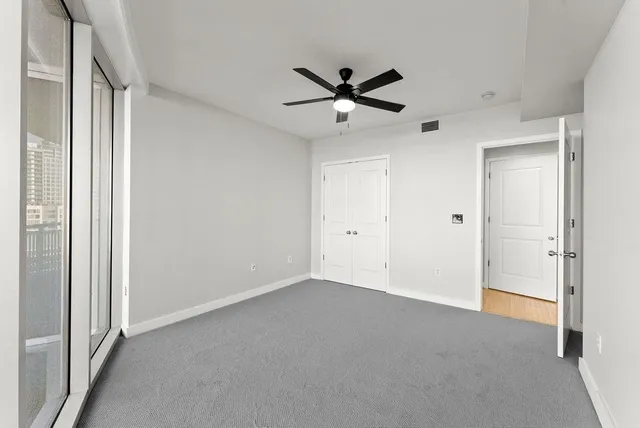 a view of a balcony with chairs