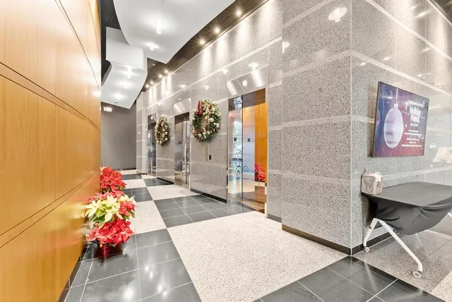 a living room with a couch and a flat screen tv