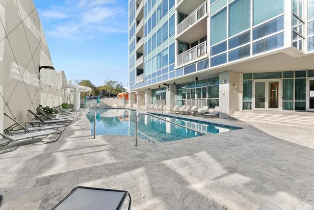 a view of a livingroom with gym equipment