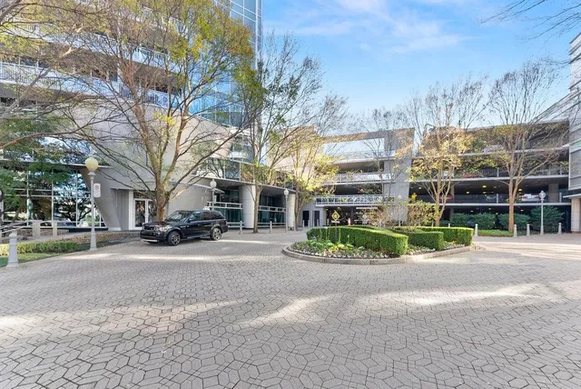 a view of city with ocean