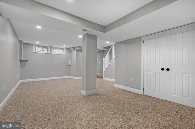 a bathroom with a sink and mirror