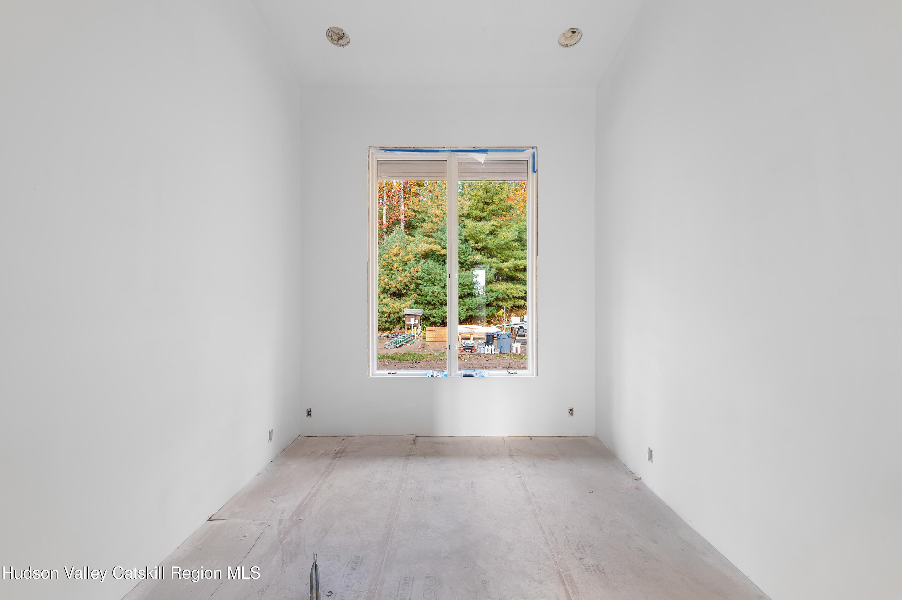 185 Stone Church Road Marbletown, NY 12401 - Photo 23 of 43 a view of a window in an empty room
