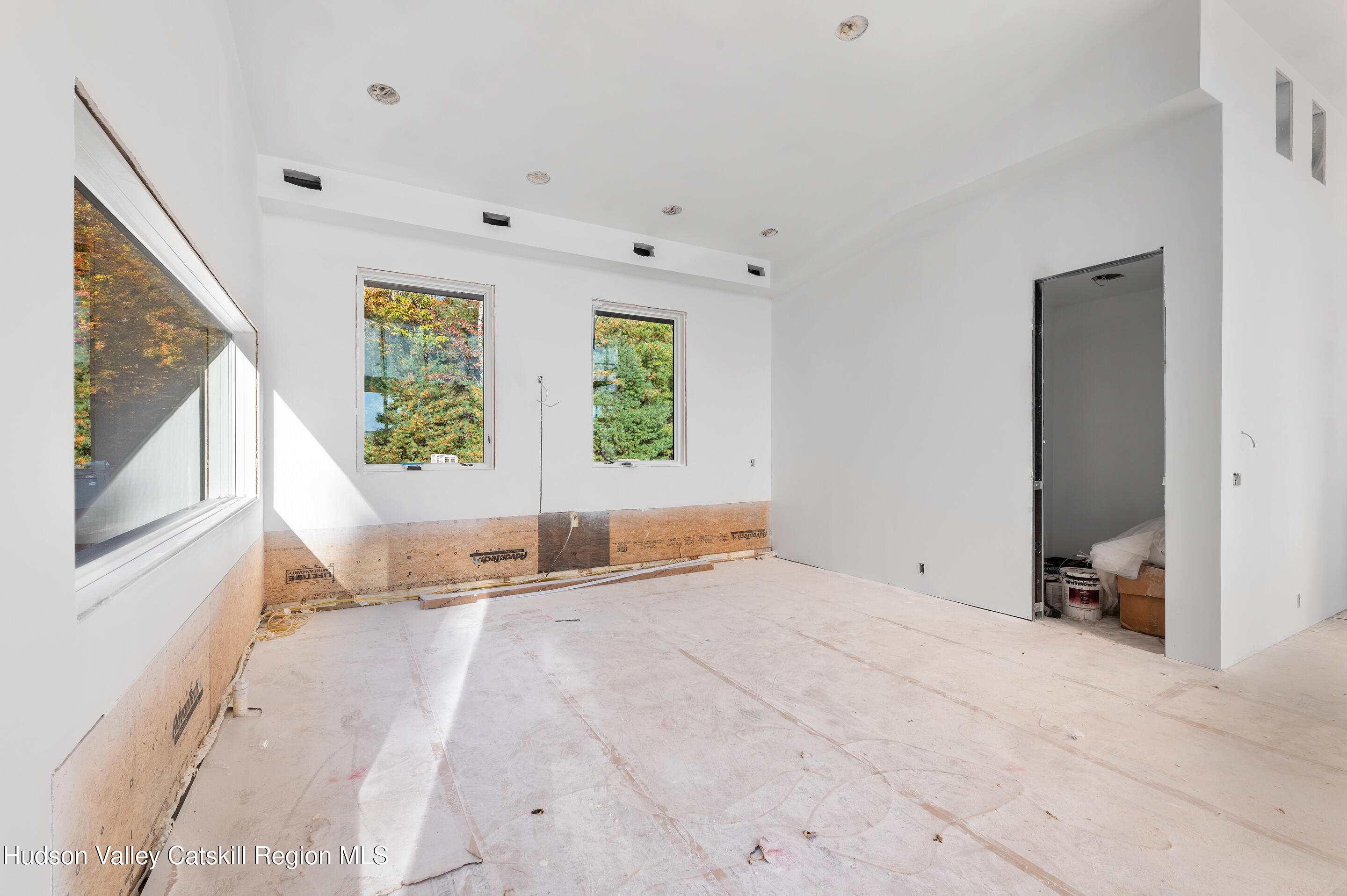 185 Stone Church Road Marbletown, NY 12401 - Photo 34 of 43 a view of an empty room with a window