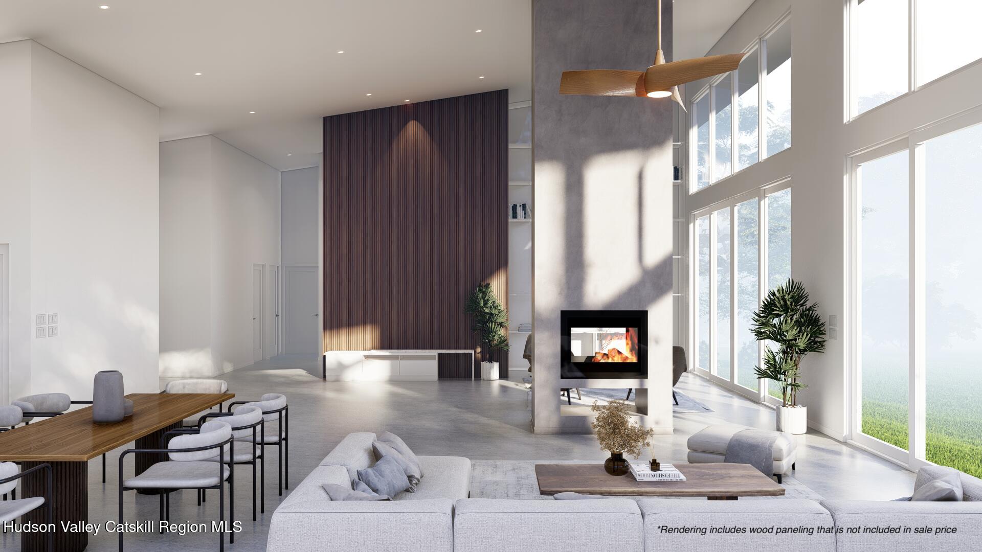 185 Stone Church Road Marbletown, NY 12401 - Photo 6 of 43 a living room with furniture a fireplace and potted plants