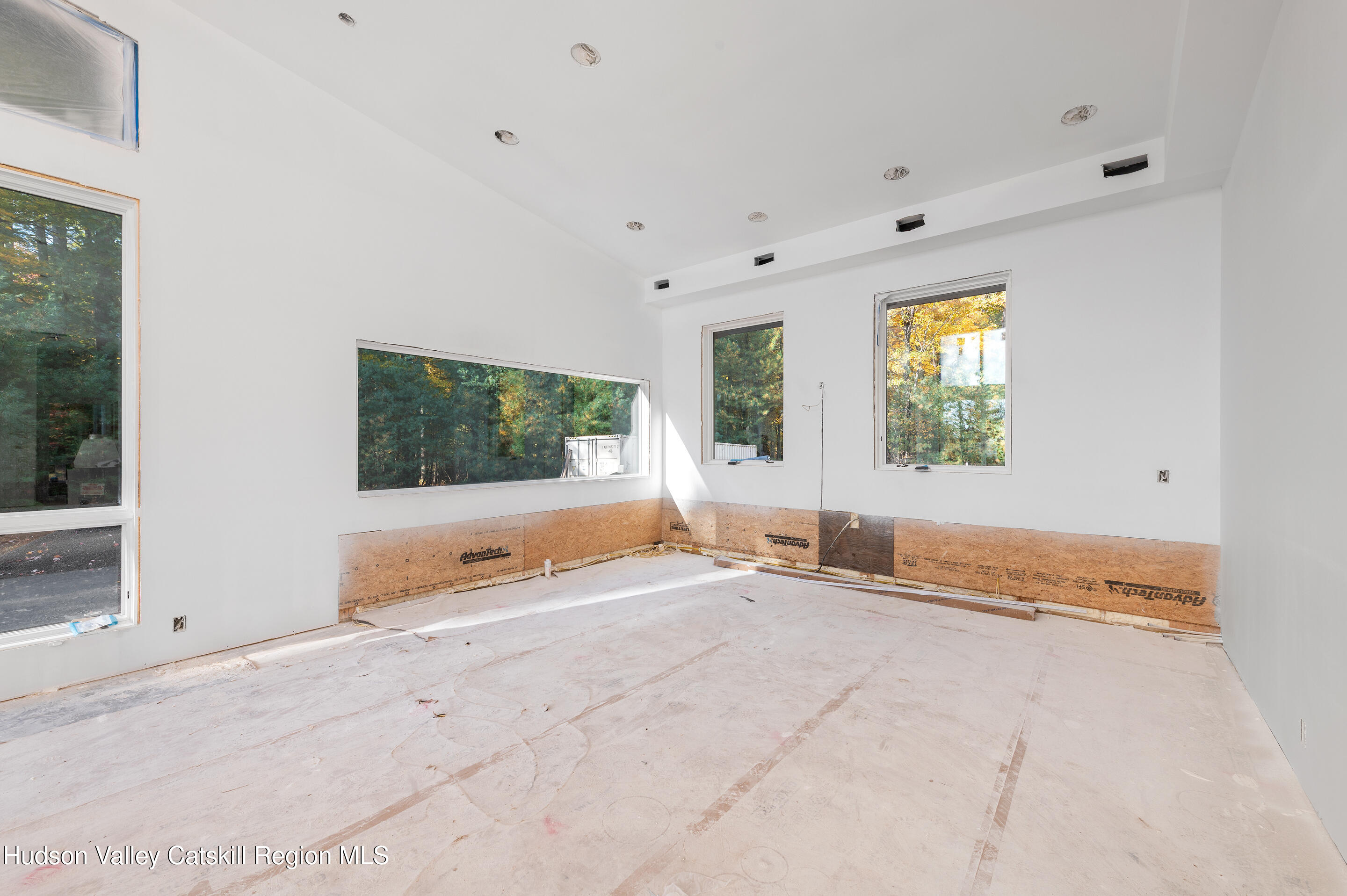 185 Stone Church Road Marbletown, NY 12401 - Photo 10 of 43 a view of an empty room with a window