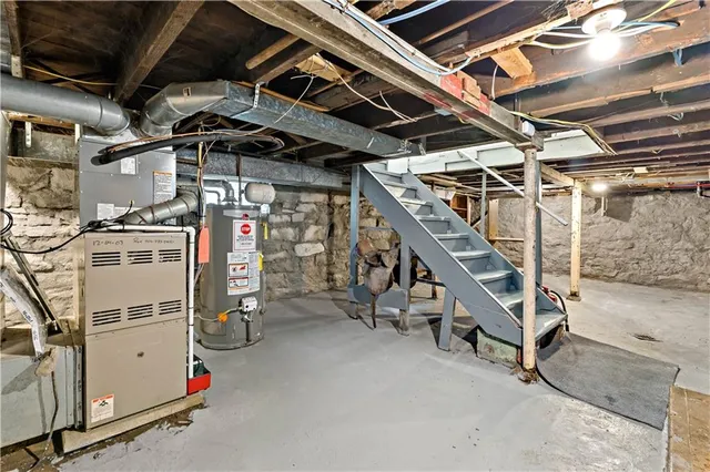 a view of empty room with wooden ceiling