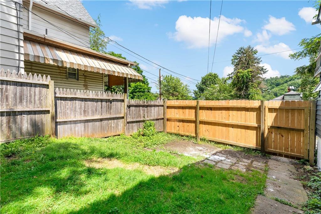 428 Card Avenue Wilmerding, PA 15148 - Photo 3 of 32 a view of backyard with wooden fence