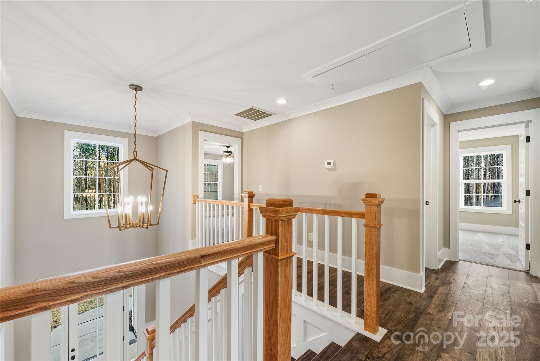 1917 Snyders Store Road, Unit 6 Wingate, NC 28174 - Photo 20 of 46 a view of a hallway with windows
