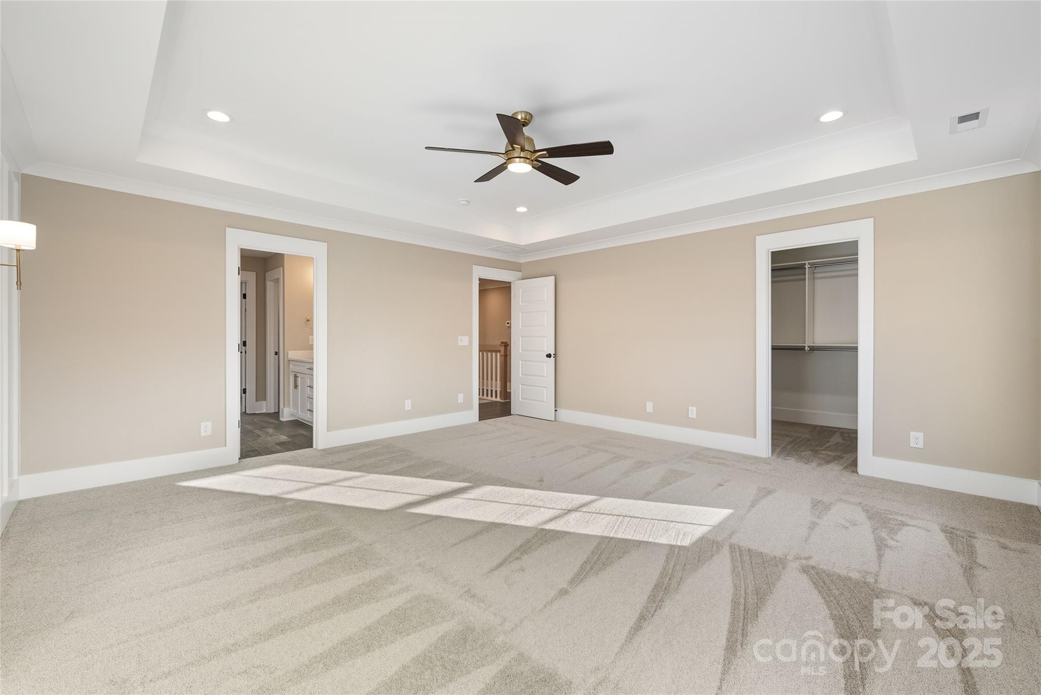 1917 Snyders Store Road, Unit 6 Wingate, NC 28174 - Photo 22 of 46 a view of an empty room with a ceiling fan