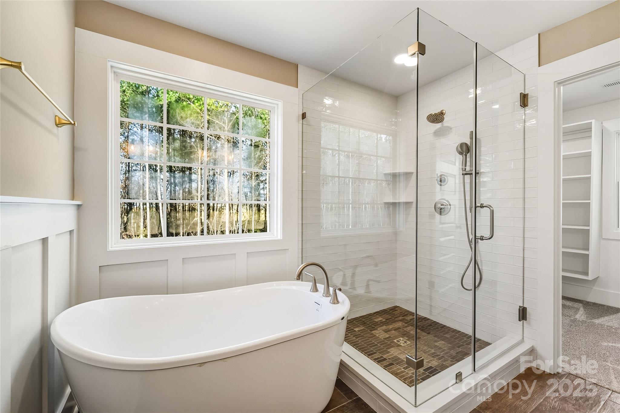 1917 Snyders Store Road, Unit 6 Wingate, NC 28174 - Photo 25 of 46 a bathroom with a bathtub and a shower