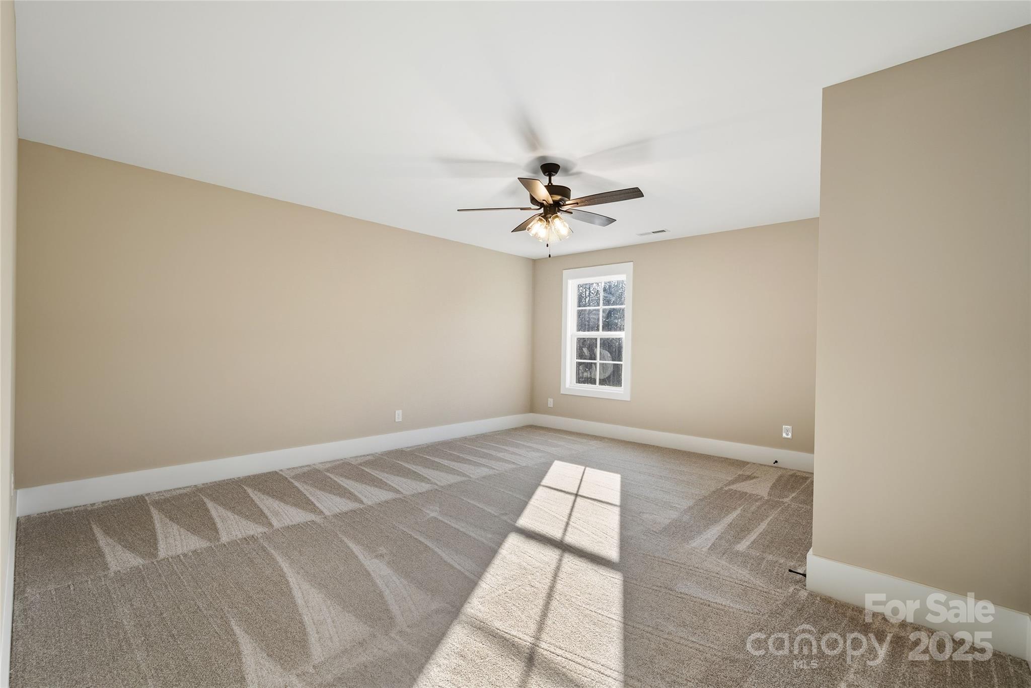 1917 Snyders Store Road, Unit 6 Wingate, NC 28174 - Photo 28 of 46 a view of an empty room with a window
