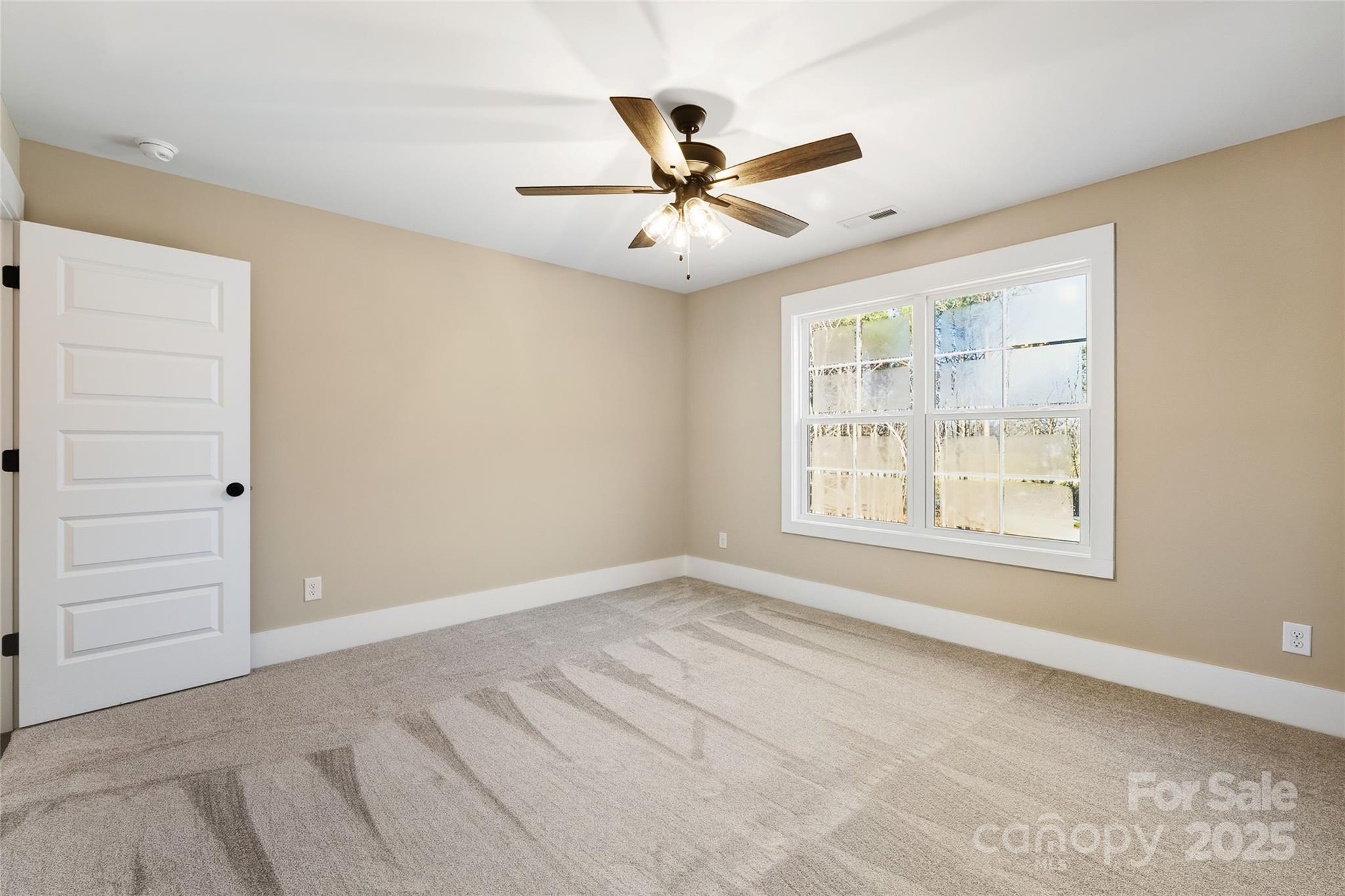 1917 Snyders Store Road, Unit 6 Wingate, NC 28174 - Photo 33 of 46 a view of an empty room with a window