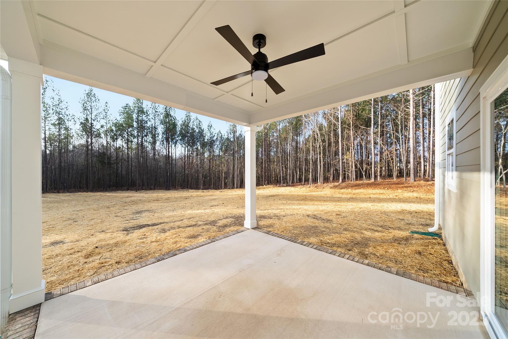 1917 Snyders Store Road, Unit 6 Wingate, NC 28174 - Photo 39 of 46 a view of a livingroom with a ceiling fan
