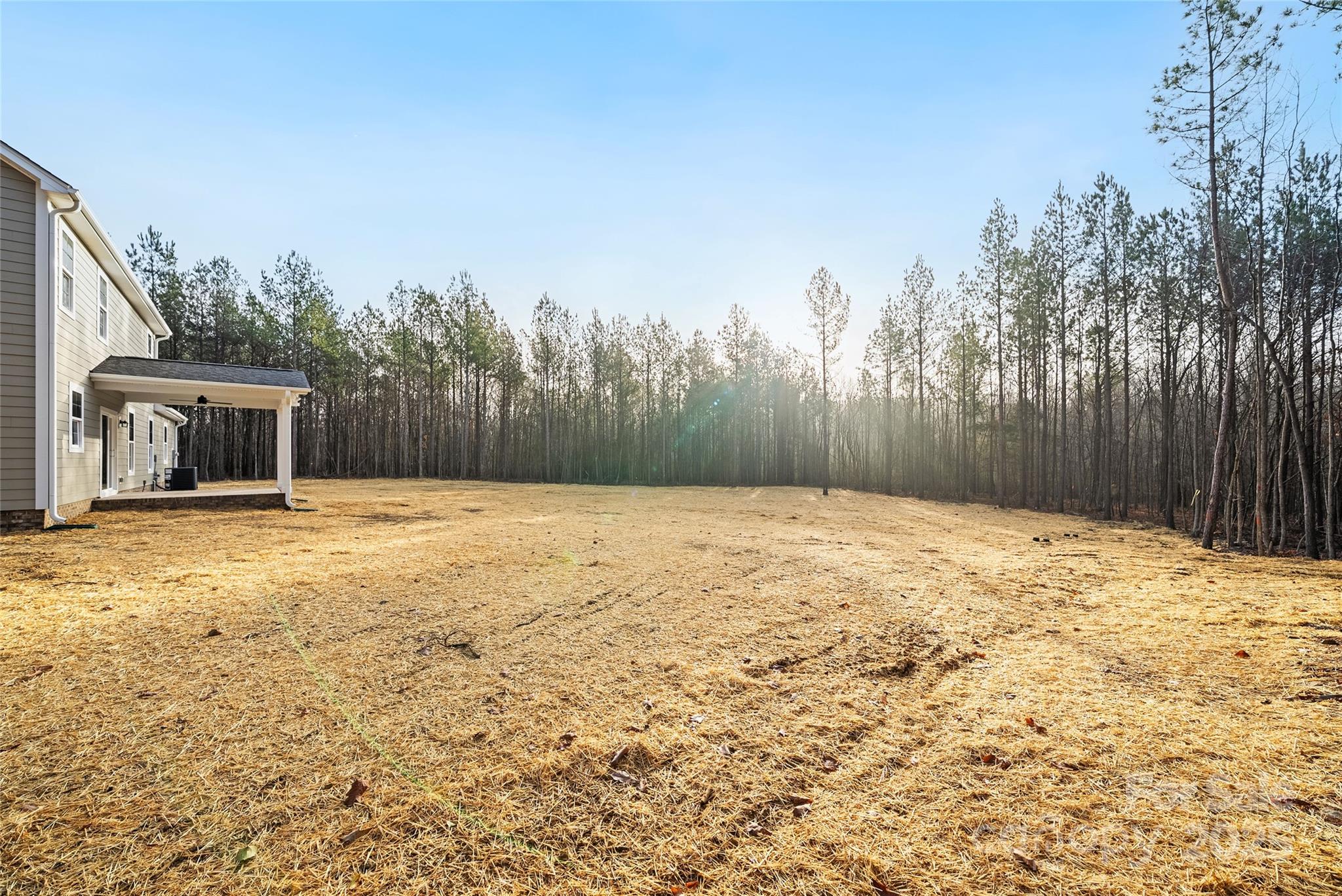 1917 Snyders Store Road, Unit 6 Wingate, NC 28174 - Photo 41 of 46 a backyard of a house