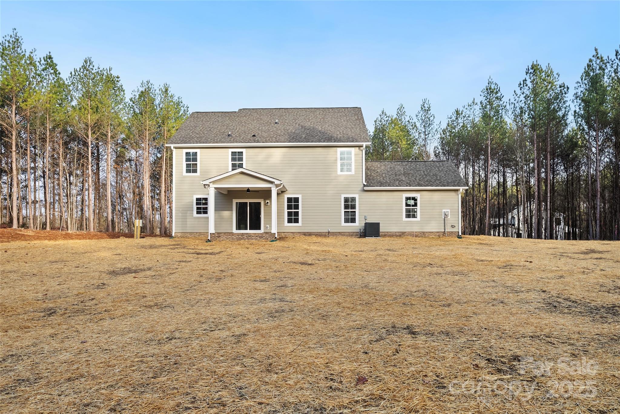 1917 Snyders Store Road, Unit 6 Wingate, NC 28174 - Photo 43 of 46 a white house that has a tree in front of it