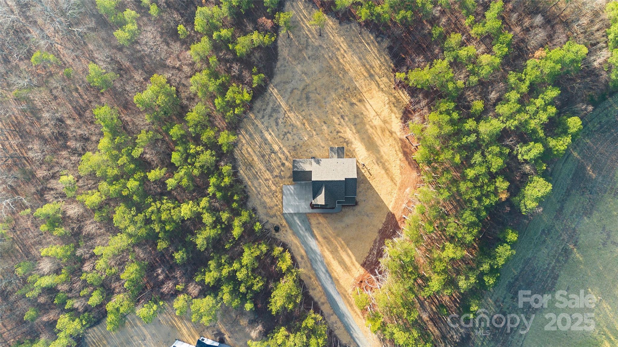 1917 Snyders Store Road, Unit 6 Wingate, NC 28174 - Photo 45 of 46 a view of a house with a yard