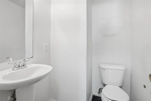 a bathroom with a sink and a toilet