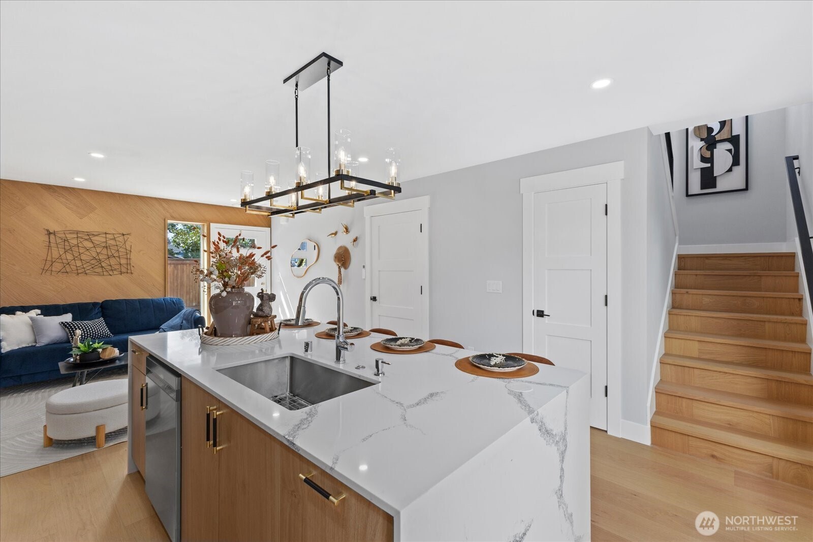 9537 Dayton Avenue North Seattle, WA 98103 - Photo 12 of 22 a kitchen with a sink a stove and cabinets