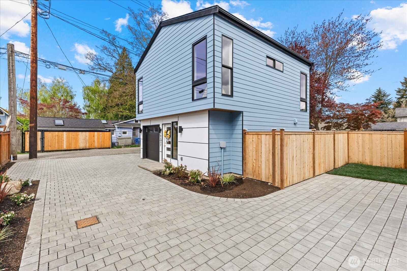 9537 Dayton Avenue North Seattle, WA 98103 - Photo 22 of 22 a view of a house with a yard
