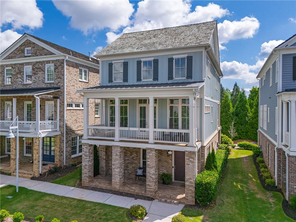 front view of a house with a yard