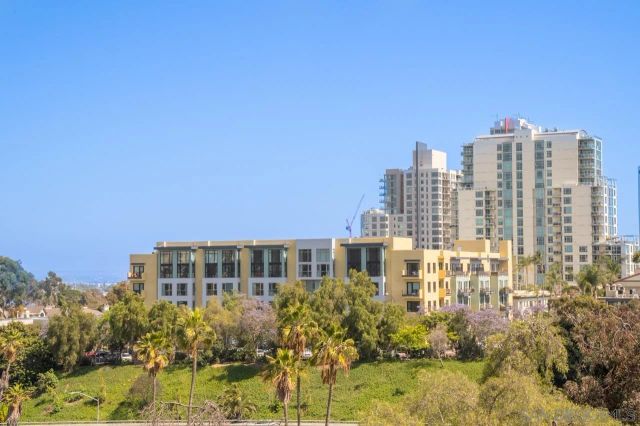 a view of a city with tall buildings
