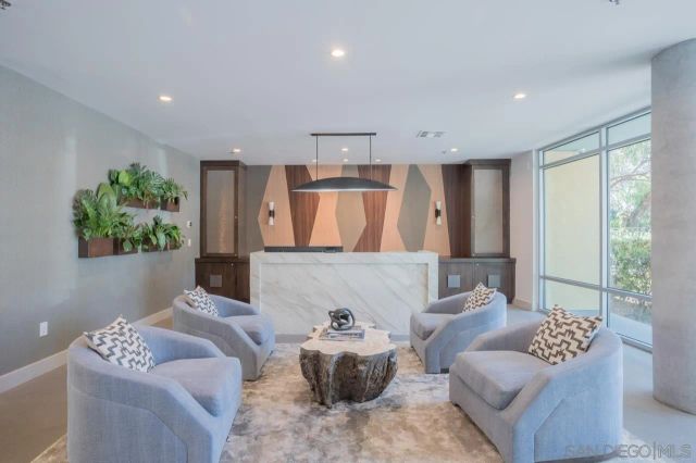 a room with furniture and a window