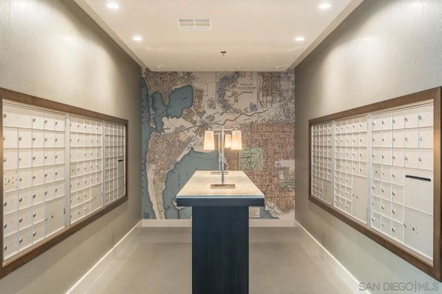 a view of a patio with a dining table and chairs with wooden floor