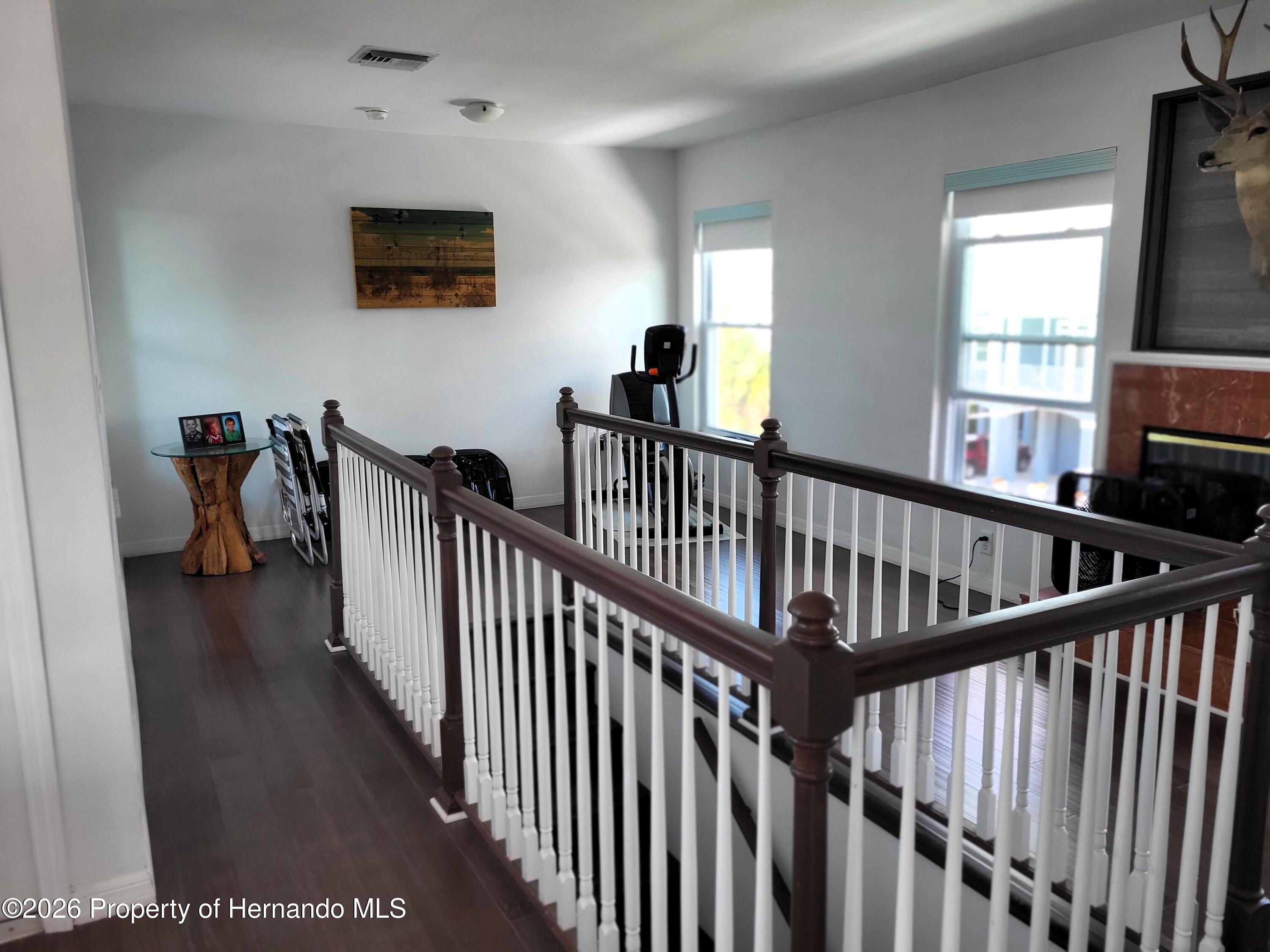 3461 Pandora Drive Weeki Wachee, FL 34607 - Photo 28 of 61 Upper Level Stairway