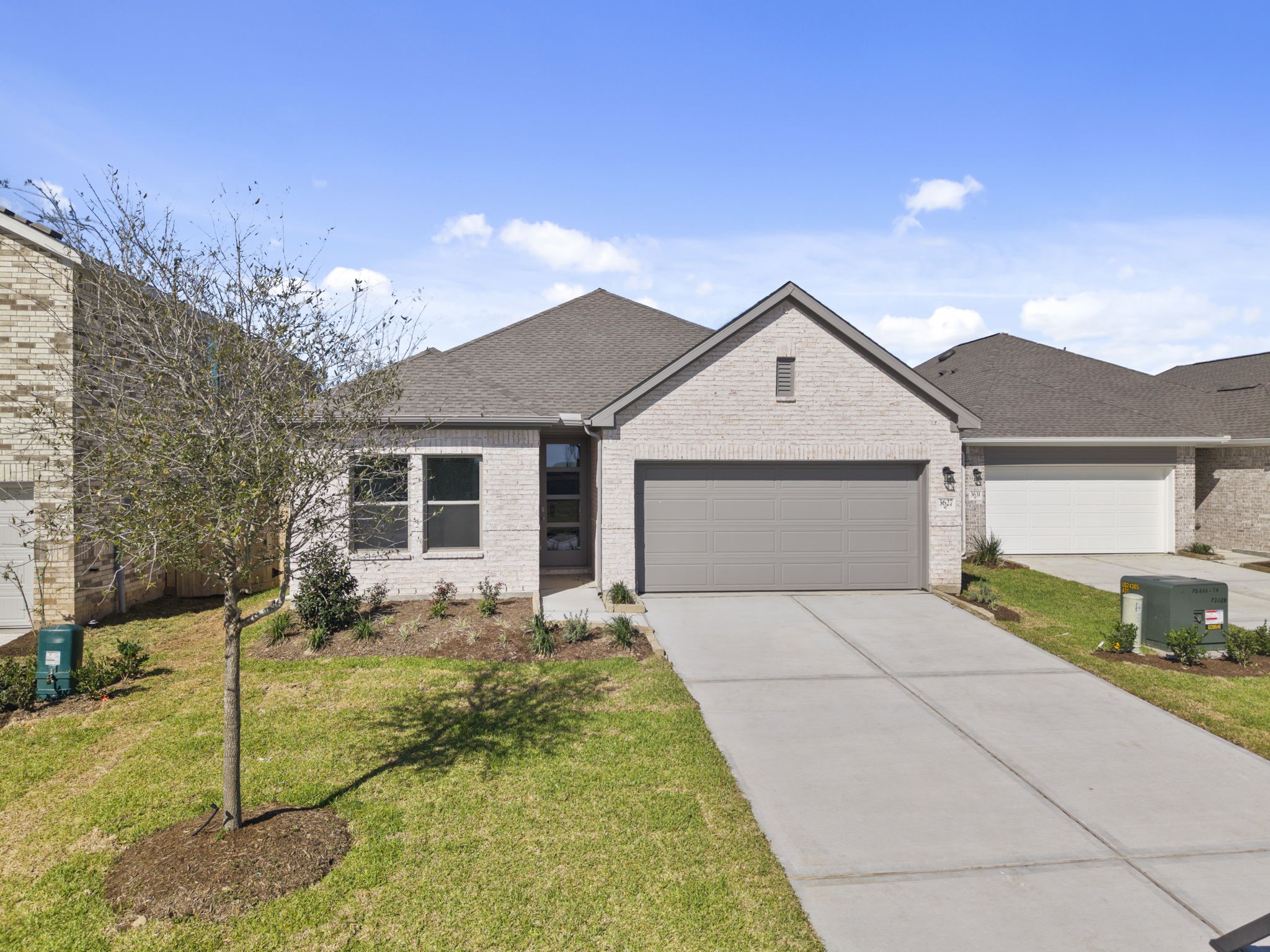 3627 Atlas Pt Lane Angleton, TX 77515 - Photo 27 of 36 a front view of house with yard and trees in the background