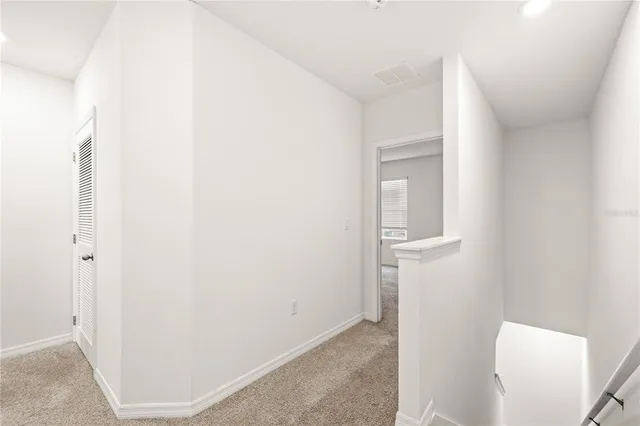 a view of small space with wooden floor