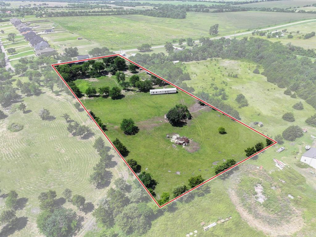 4453 Farm To Market 902 Howe, TX 75459 - Photo 21 of 40 Expansive land parcel featuring a green landscape, mature trees, and a clear boundary outline